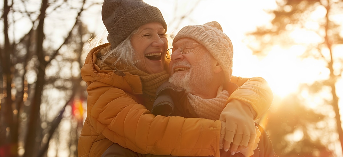 Happy mature couple managing their tinnitus with a stress-free lifestyle