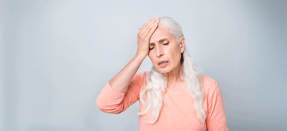 Mature woman experiencing vertigo