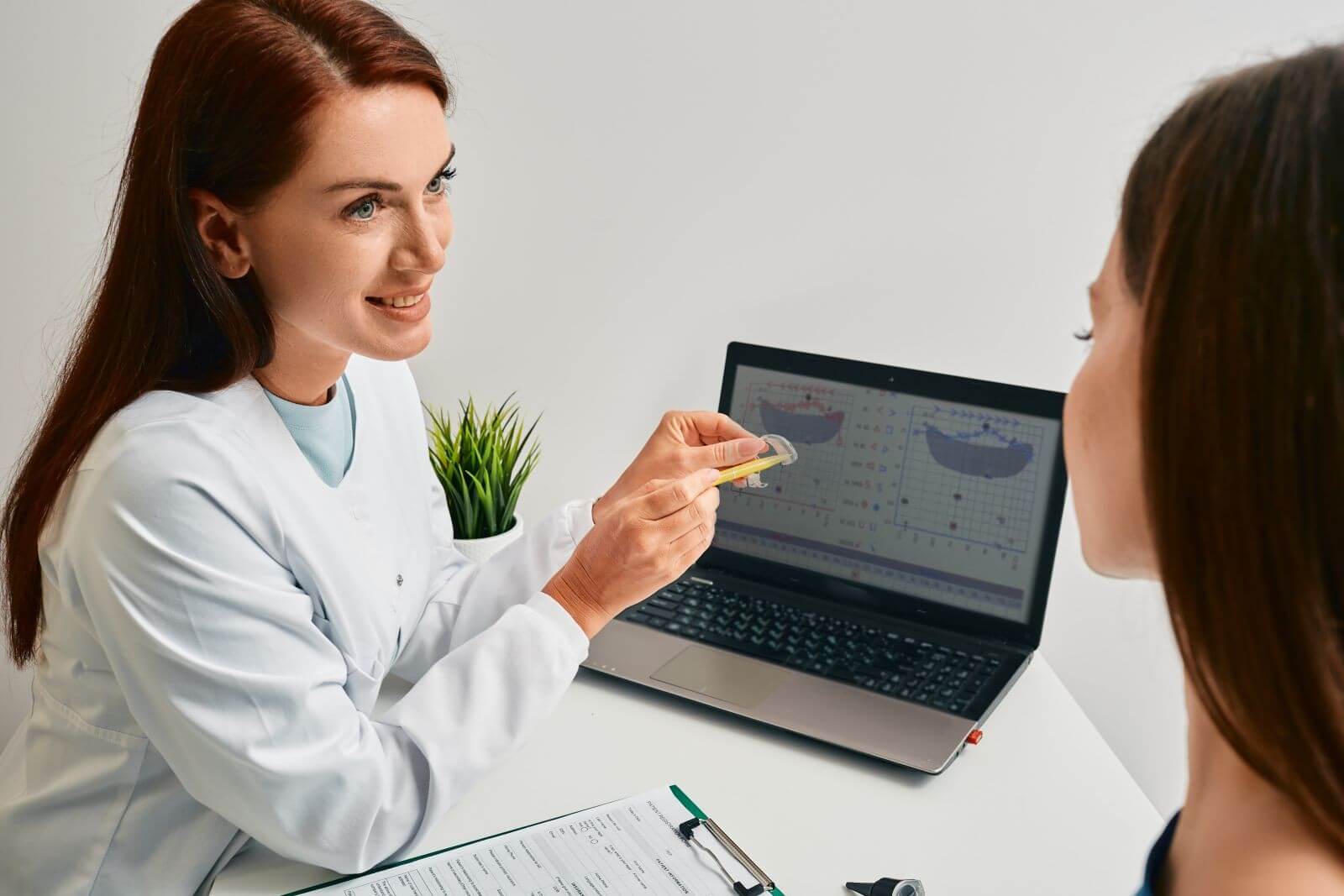 audiologist advising patient